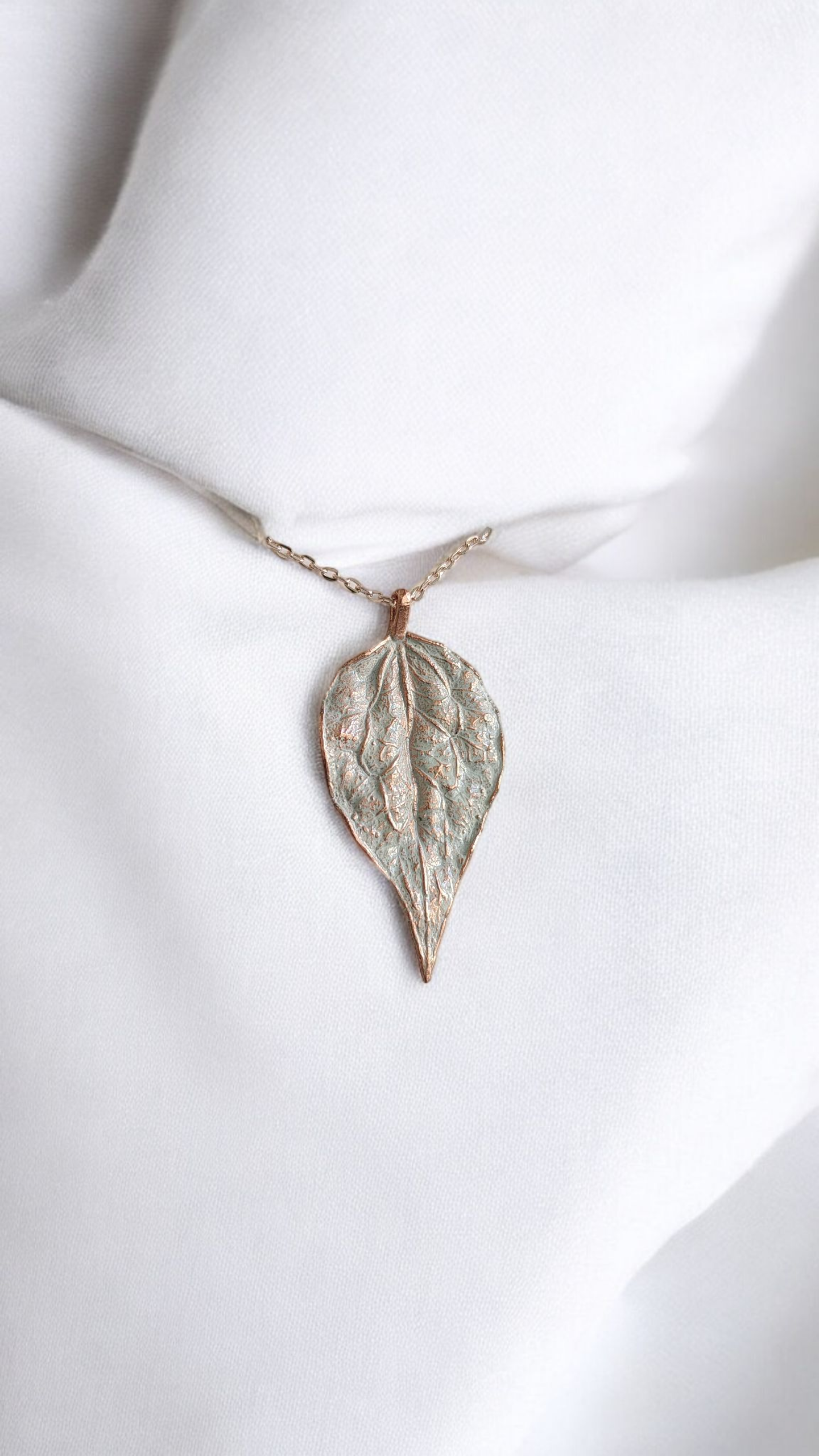 Copper Hosta Leaf Pendant. White Patina.