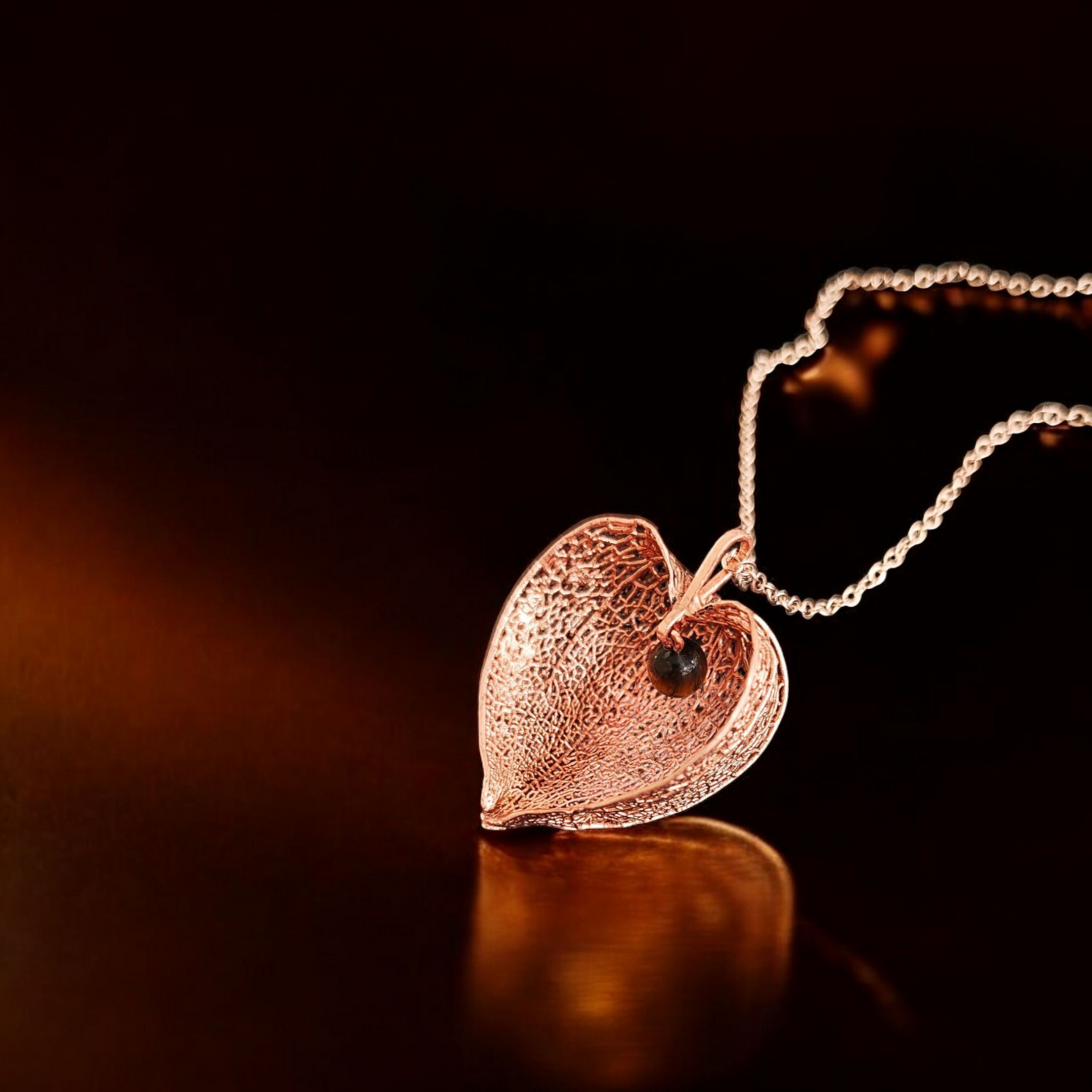 Copper pendants made from real leaves