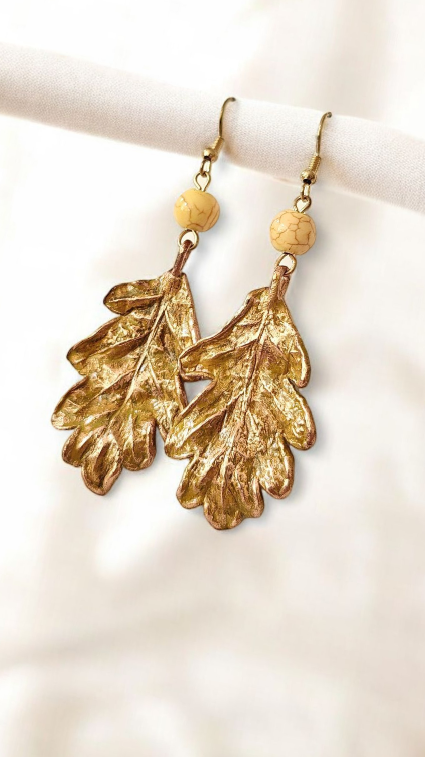 Oak Leaf Earrings with Yellow Howlite, Golden Patina